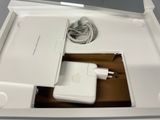 a white box with a charger and a charger in it