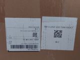 the box is brown and has a qr code on it