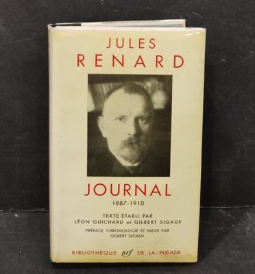 a book with a black and white photo of a man in a suit