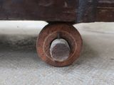 a close up of a rusted metal object on the ground