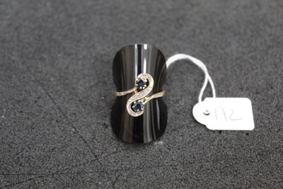 a close up of a ring with a tag attached to it