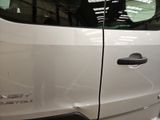 a white van that is parked in a garage