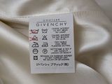 givenchy label on a white shirt with a black and white design