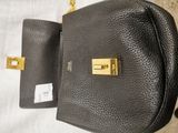 michael korsh black leather purse with gold hardware