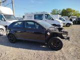 an image of a car that has been wrecked in a lot