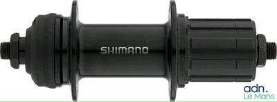 a close up of a bicycle hub with the words shimano on it