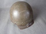 a close up of a helmet on a table