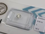 an image of a diamond in a clear box on a white surface