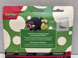 the back of a package with a picture of a black dog in a green polka dot pattern