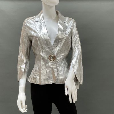 an image of a mannequin wearing a shiny jacket