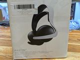 the box of the sony headphones is sitting on the table