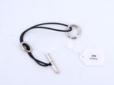 silver plated keychain with black leather cord and silver metal clasp