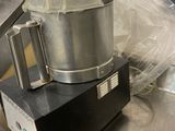 a blender sitting on top of a counter in a kitchen