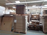 a large warehouse filled with lots of boxes and pallets