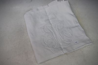 a piece of white cloth with a monogram on it