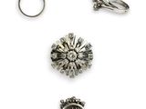 three silver rings and two silver rings with diamonds on them