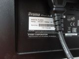 a close up of a power cord connected to a computer