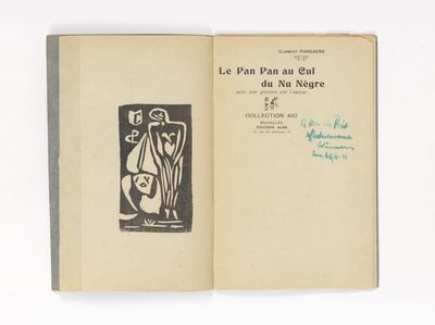 un livre ouvert sur lequel figure un dessin en noir et blanc