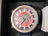 a watch that is in a box on the table