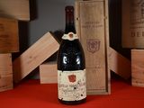 a bottle of wine that is sitting on a table