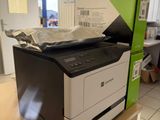 a printer that is sitting on top of a table