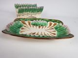 pair of green and white dishes on a white surface