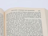 a open book with a picture of a cat on it