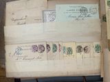 many different stamps on a piece of paper on a table