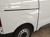 a white van that is parked in a garage