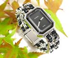 an image of a wrist watch with a chain around it