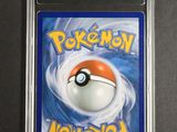 a close up of a pokemon card on a table
