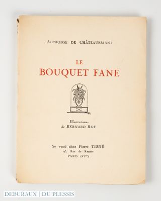 un vieux livre sur lequel figure l'image d'un oiseau en cage