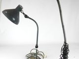 two lamps that are sitting on a table