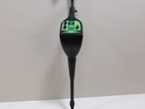 an image of a metal detector sitting on top of a white table
