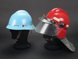 pair of red and blue helmets on black mannequin heads