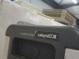 a machine that is sitting inside of a building