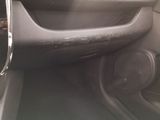 a close up of a car door handle with the door handle open