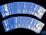 a lot of pokemon playing cards on a black background