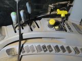 a close up of a car ' s engine and dashboard controls