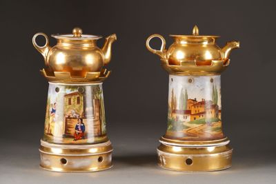 pair of gold - plated vases with painted scenes on them