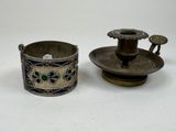 pair of silver and enamel candlestick holders and a silver and enamel candle holder