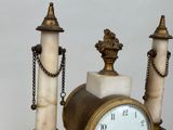 a clock that is sitting on top of a table