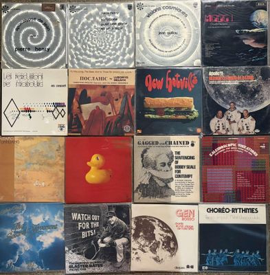 many different types of vinyl records on the wall