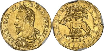 a gold coin with an image of a woman and a lion on it