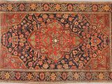 tapis persan ancien à motif de médaillon sur fond bleu