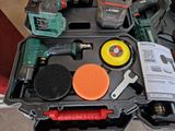 a tool kit that includes a drill, sander, and other tools
