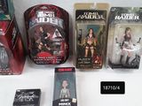 many action figures on display on a white table