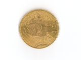 an image of a gold coin on a white surface
