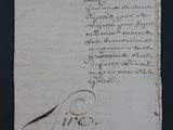 un gros plan d'un morceau de papier sur lequel on a écrit