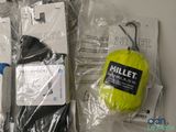 a bag of tennis balls and a tennis ball on a table